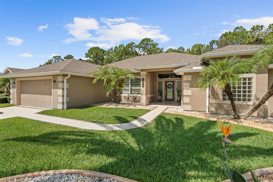Impeccably renovated and move-in ready, this exceptional pool home, with 2022 roof, is nestled within the prestigious gated community of Plantation Bay Golf & Country Club. From the moment you enter through the double glass front doors, you'll appreciate the elegant 24x36 tile flooring, crown molding, and abundant natural light throughout the home. The formal living room makes a grand first impression with tranquil pool views and seamless flow into the main living areas. The formal dining room is ideal for entertaining, featuring oversized tile floors, custom blinds, crown molding, and a stylish accent wall. The heart of the home is the fully renovated kitchen, complete with double-stacked cabinetry to the ceiling, quartz countertops, soft-close dovetail drawers, tile backsplash, pantry closet, and premium KitchenAid stainless steel appliances. The adjacent breakfast nook is surrounded by large windows overlooking the pool and preserve and offers direct access to the lanai. The spacious family room invites gatherings with its shiplap accent wall, electric linear fireplace, crown molding, and large picture windows showcasing preserve and pool views. The private primary suite features tray ceilings, slider access to the lanai, and dual walk-in closets. The spa-inspired en-suite bath offers separate quartz-topped vanities with custom beveled mirrors, a walk-in shower, and a large soaking tub. A split floor plan provides three additional bedrooms, ideal for guests or a home office, along with a second full bath featuring a tub/shower combination and convenient pool access. Step outside to a private resort-style oasis with a newly added pool featuring a fountain wall, stacked stone accents, sun shelf with bubblers, covered lanai, electric awning for added shade, and a fully fenced dog run, perfect for year-round outdoor living. Additional highlights include a 2022 roof, 2024 HVAC system and water heater, new re-drilled irrigation well, whole-house water filtration system, Ecobee smart thermostat, six new oversized picture-frame windows, rock-bed landscaping with mature plantings, an interior laundry room with cabinetry, and a deep garage offering space for two cars plus a golf cart and utility sink. Located within Plantation Bay Golf & Country Club, residents enjoy optional membership access to 45 holes of championship golf, two clubhouses including a new 30+ million dollar clubhouse, resort-style pool, full-service spa and fitness center, tennis and pickleball courts, walking trails, on-site dining, and 24/7 gated security. Buyers of this home to receive a substantial discount on initiation fee at the club, ask listing agent for details. This exceptional home offers luxury, comfort, and lifestyle, Florida living at its finest.