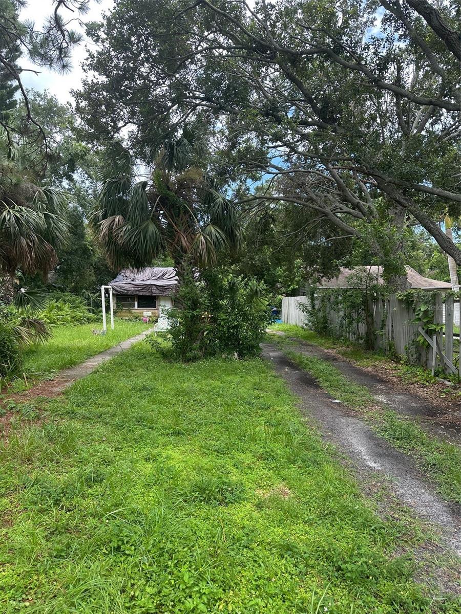 House is not salvageable. Lot is 50x162', located in NT-1 zoning and did not receive flood damage during last year's storms. Neighboring lot is in flood zone X500. Potential to build new and up above flood zone. The long lot leaves room for an ADU in the back of the property.