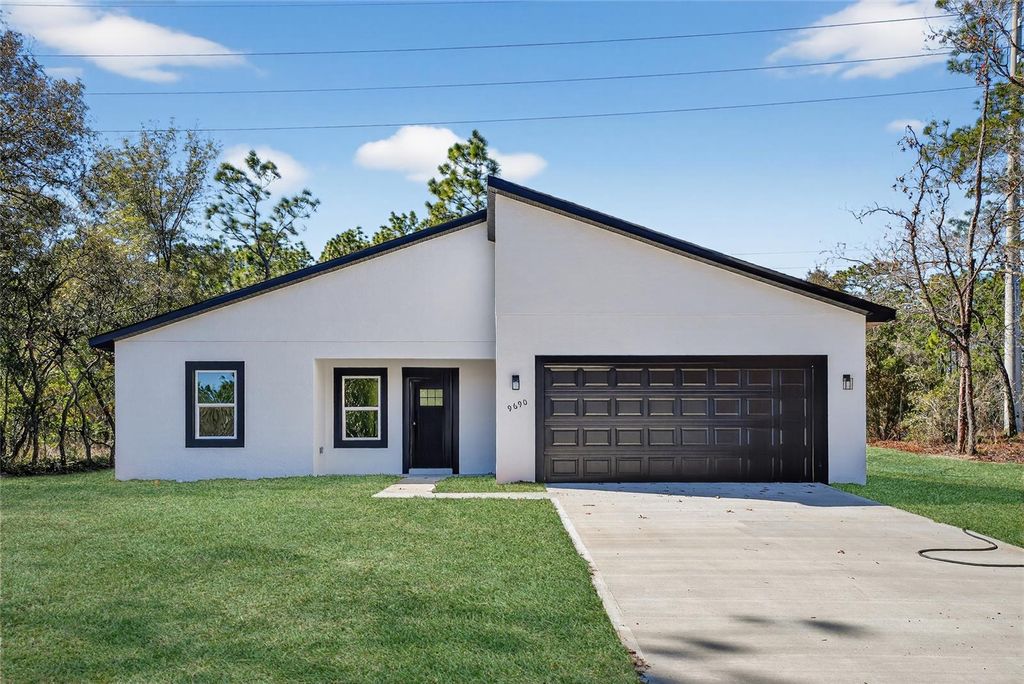 Photo of 9690 N Cortlandt Drive, Citrus Springs, FL 34434 (MLS # O6380455)