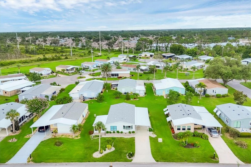 Photo of 711 Tangerine Woods Boulevard, Englewood, FL 34223 (MLS # D6143076)