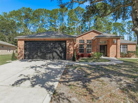 Photo of 31 Pony Express Drive, Palm Coast, FL 32164 (MLS # FC314909)