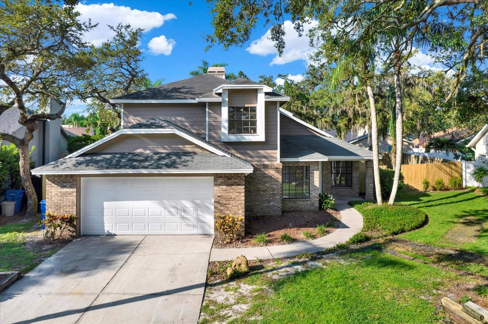 Offered below appraisal amount of $647,000 -- for quick sale! This stunning pool home truly checks all the boxes! Nestled in the sought-after community of Cumberland Manors, this completely updated 4-bedroom, 3-full bath, pool home offers the perfect blend of luxury, functionality, and style. Step inside to discover a spacious formal living and dining area. The large, modern kitchen, with granite countertops and stainless-steel appliances, features a cozy eat-in space and flows seamlessly into the family room. On the first floor, you'll find a full bedroom and bathroom, perfect for guests or multi-generational living. Ascend the beautifully designed staircase, with custom shiplap and cable railing, to the second floor, where you'll find three additional bedrooms and two additional bathrooms. The show-stopping primary suite is a true retreat, featuring a double-sided fireplace, a private patio with TV hookup, overlooking the pool, and a luxurious ensuite. Pamper yourself in a spa-like bathroom with a clawfoot tub with mood lighting, a fireplace with custom-built drawers for your laundry and firewood, an oversized shower, an oversized walk-in closet and elegant new windows. For added convenience, all rooms have recessed lighting, ceiling fans and USB-port electrical outlets. Step outside and soak up the Florida sunshine in your private pool! The spacious screened-in lanai offers the perfect setting for entertaining, relaxing, or sunbathing. Beyond the lanai, you'll find a generously sized, fully fenced backyard, ideal for a playground or pets. Conveniently located near shopping, dining, schools, uptown/downtown Tampa, and the Tampa International Airport.