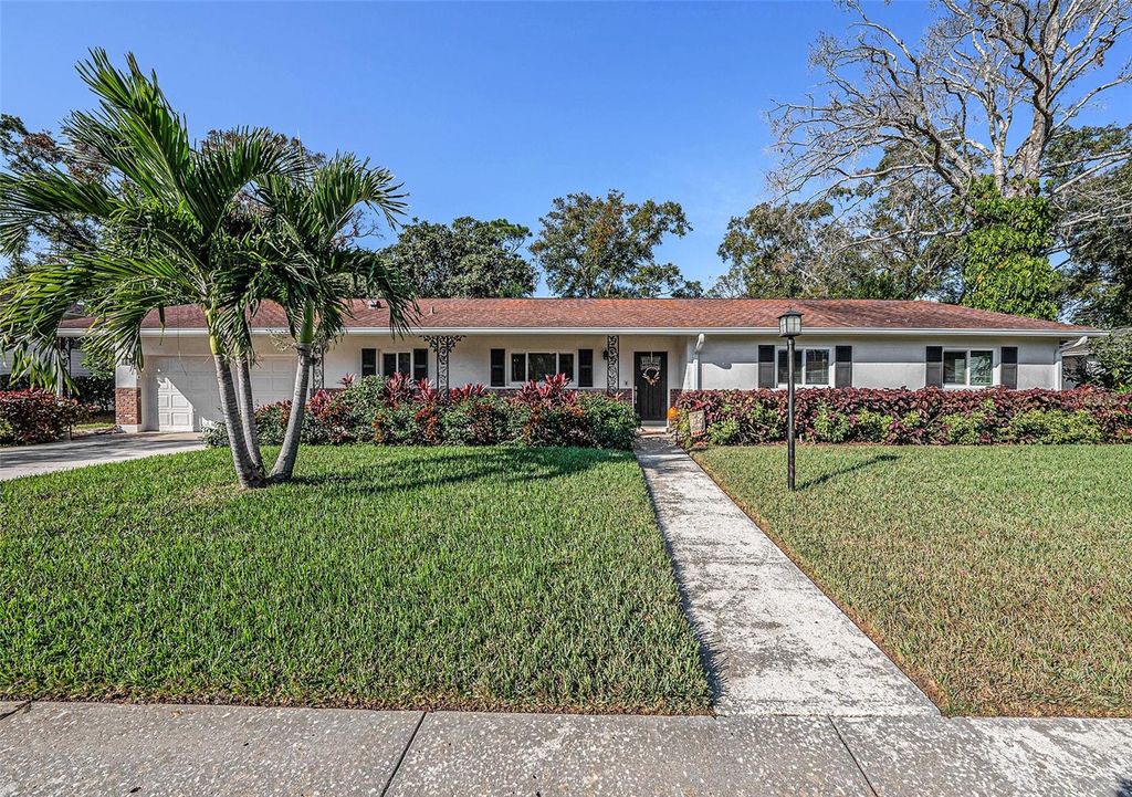 Photo of 12710 Greenmoor Drive, Tampa, FL 33618 (MLS # TB8451413)