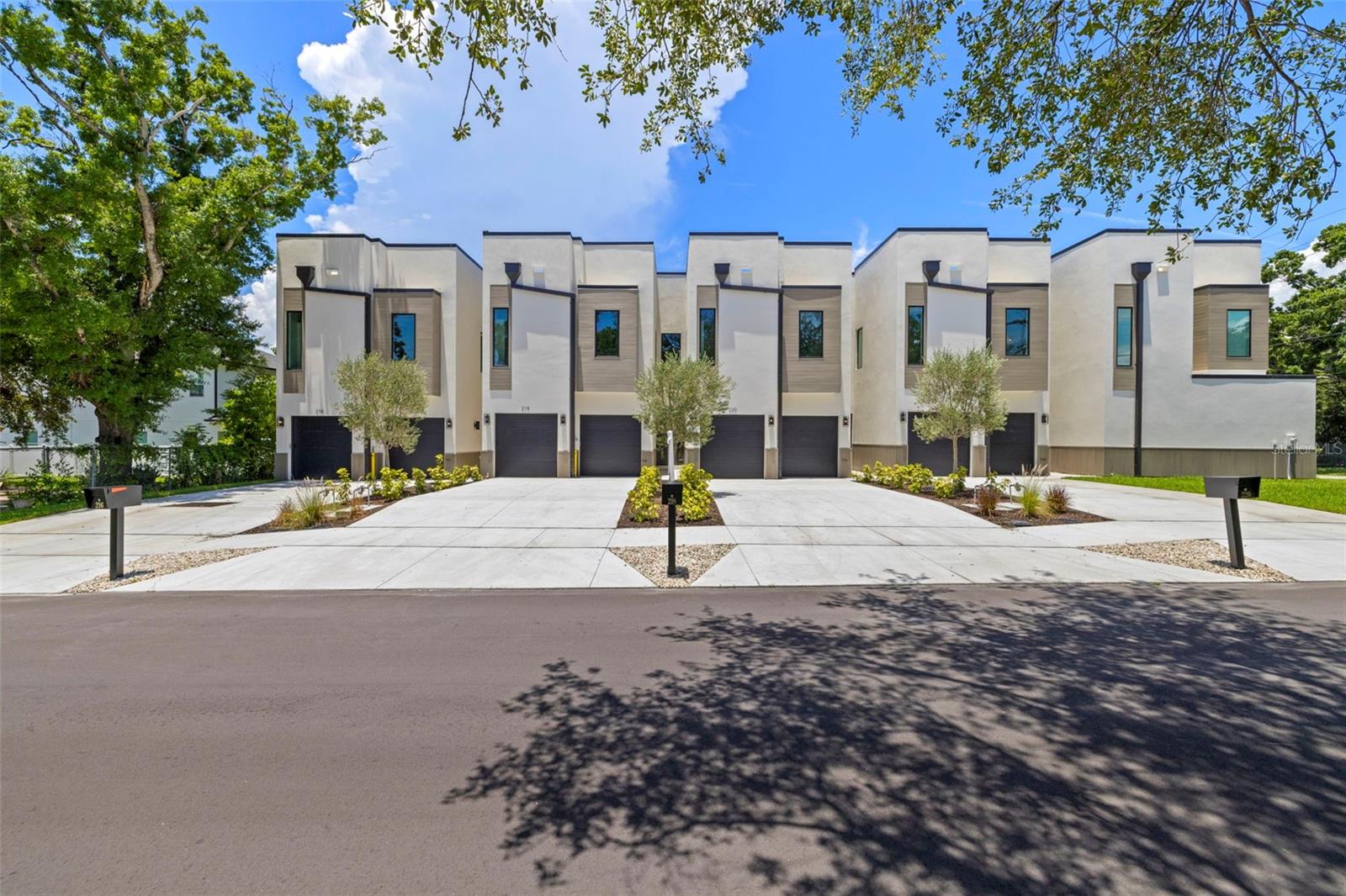 Brand New 2025 Milana Custom Homes Townhome 3 Bed, 4 Bath + Study & Den 2,592 SF of Modern Living! Be the first to enjoy this beautifully designed 2025 townhome offering 3 bedrooms, 4 full baths, a dedicated study, game room/den, and a 2-car garage all thoughtfully laid out across 2,592 SF of stylish living space. Main Floor Highlights: Step into a spacious open-concept living and dining area that flows seamlessly into the gourmet kitchen featuring quartz countertops, stainless steel appliances, and large windows providing a full view of the covered lanai and backyard. A private study and full bath are conveniently located just off the living room perfect for a home office or guest suite. Second Floor Comfort & Versatility: Upstairs you'll find a central den/game room, flanked by two bedrooms with private en-suite baths on one side, and the luxurious primary suite on the other. The primary suite boasts a spa-inspired bath with a freestanding soaking tub, walk-in shower, and an oversized walk-in closet with custom built-in shelving. Convenient Laundry Space: The upstairs laundry room includes quartz countertops, cabinetry, and wall shelving for added storage and functionality. Great location! Just a short drive to Westshore Mall, International Mall and Tampa International Airport. Photos are from a staged unit, finished units are similar.