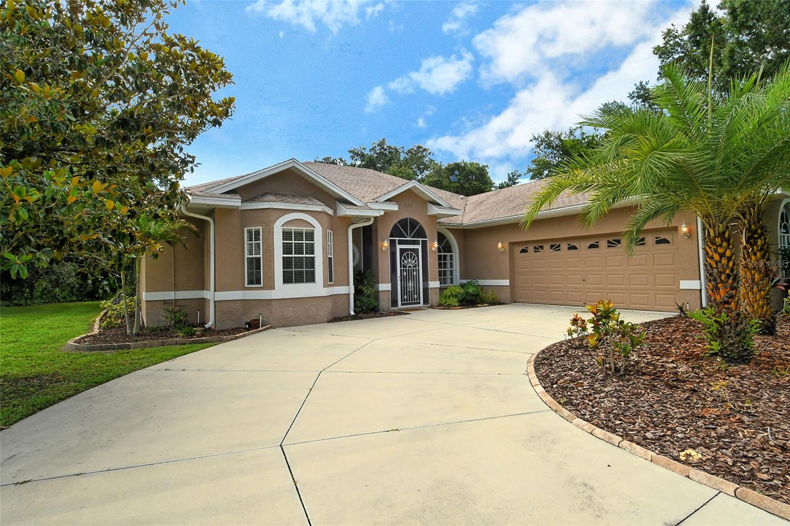 Delightful Hidden Oaks! A quiet community on the Manatee River offers a private boat ramp for residents with a floating dock with water and electric. Perfect for entertaining with an open kitchen that has a large dining room with fireplace accented with niches. Wood cabinets, granite counters, Stainless appliances, Breakfast bar and nice pantry cupboards. Family room is very relaxing and has a plant shelf. Primary Bedroom has a slider that goes out to the pool. Primary bath has a Jacuzzi Tub & updated shower and huge walk-in closet. Bedrooms 3 & 4 share a Jack and Jill bath. The pool area is a WOW with paver decking and perfect view of the private wooded back yard. Large side entry garage offers a back door for golf carts or lawn mowers. Lot is oversized at .74 of an acre.