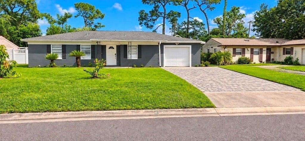 Photo of 8007 Meadowglen Drive, Orlando, FL 32810 (MLS # O6452048)