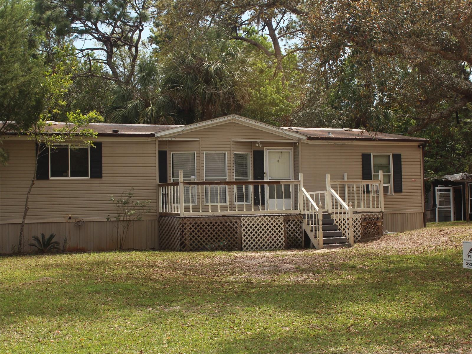 Charming 3-Bedroom Home on Nearly an Acre in Homosassa! 2 full lots! 7538 W CLEARBROOK LN HOMOSASSA, FL 34448 is the vacant lot next door that is included with the sale. Tax id#17E20S36 2A0B0 0540.
Welcome to your new Home! This spacious 3-bedroom, 2-bathroom home sits on a nearly one-acre double lot, offering plenty of room to relax, garden, or entertain.
Step onto the inviting front wood deck porch, perfect for morning coffee or evening sunsets. Inside, you’ll find vaulted ceilings and an open layout that gives the home a bright, airy feel. Each of the three bedrooms features its own walk-in closet, and there's a dedicated laundry room for added convenience.
Enjoy outdoor living with a rear wood deck patio, two storage sheds for all your tools and toys, and a one-car carport. Best of all, this property did not flood during last year's hurricanes, offering peace of mind year-round. New Roof!
Don’t miss your chance to own this slice of Florida paradise—schedule your showing today!