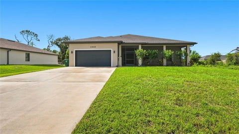 Photo of 11929 Florence Avenue, Port Charlotte, FL 33981 (MLS # A4704938)