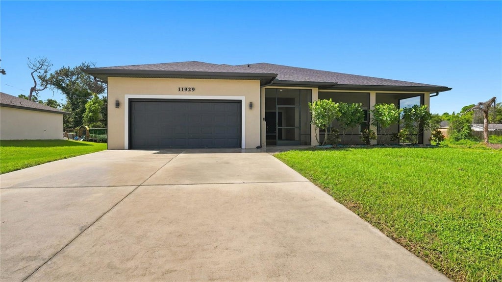 Photo of 11929 Florence Avenue, Port Charlotte, FL 33981 (MLS # A4704938)