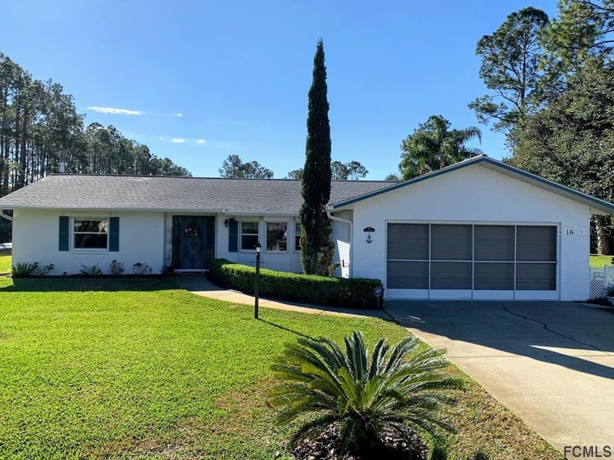You are going to love the comfort, value, and Florida lifestyle this beautifully cared-for Palm Coast pool home has to offer. Situated on an oversized corner lot with a fully fenced yard and inviting curb appeal, this home delivers far more usable living space than the bedroom count alone might suggest.
Inside, the home features two generously sized bedrooms, and each bedroom has access to its own bathroom, creating the feel of two private suites. This layout works beautifully for owners, guests, extended stays, or anyone who values comfort and privacy. The flexible floor plan also includes both a living room and family room, giving the home multiple gathering areas and a much larger feel than expected.
The enclosed Florida room adds even more usable lifestyle space and includes a kitchen pass-through, making it ideal for entertaining, relaxing, hobbies, overflow dining, or enjoying the pool view in comfort. Combined with the separate living areas, the home feels spacious, practical, and easy to enjoy.
The remodeled kitchen is a standout feature, thoughtfully updated with attractive cabinetry, glass-front display cabinets, generous drawer storage, upgraded stainless steel appliances, a Bosch dishwasher, breakfast bar, and wine/beverage cooler. The kitchen connects nicely to the main living areas and Florida room, creating a functional layout for everyday living and entertaining.
Step outside to the screened inground pool, a true centerpiece of the property and an ideal setting for Florida living. Whether you are relaxing poolside, entertaining friends, or enjoying the privacy of the fenced yard, this outdoor space adds tremendous appeal.
Additional features include tile and wood-laminate flooring, inside laundry, screened garage, water softener/treatment system, and roll-down storm shutters that can be conveniently operated from inside the home — a valuable Florida feature that adds comfort, security, and peace of mind.
With its oversized corner lot, two large private bedroom suites, remodeled kitchen, multiple living areas, enclosed Florida room, screened pool, fenced yard, and well-maintained condition, this home is a must-see for buyers looking for comfort, privacy, function, and true Florida living. New Roof installed 2021