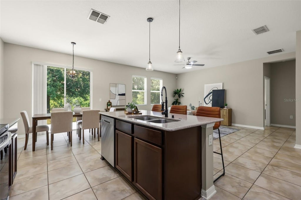 Photo of 215 Lakes Shore Drive, Davenport, FL 33837 (MLS # O6437367)