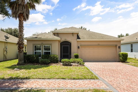 Photo of 215 Lakes Shore Drive, Davenport, FL 33837 (MLS # O6437367)
