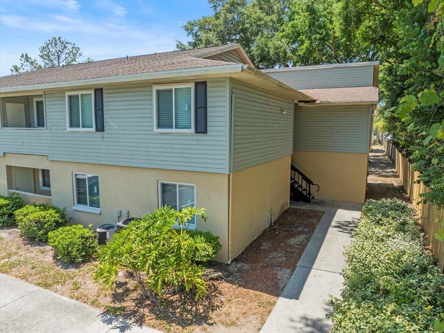 One or more photo(s) has been virtually staged. WHAT A DEAL!!!  Don't miss this opportunity to own one of the few 3-bedroom, 2-bath condos in this highly sought-after community for at this great price! Featuring a bright, open floor plan, this freshly painted home offers a welcoming, neutral palette ready for your personal touches. The upgraded kitchen is a chef’s delight with beautiful wood cabinets, granite countertops, a new microwave, and a convenient breakfast bar perfect for casual dining. The split-bedroom layout provides privacy, with the spacious primary suite boasting a charming en-suite bathroom. Step outside to enjoy a cozy balcony with an extra storage room — ideal for keeping things organized. Plus, this home has been updated with all new windows, offering energy efficiency and modern appeal. There is also an area inside the home for a washer/dryer for convenience. Located near top shopping centers, malls, dining, and major roadways, your commute and entertainment options will be a breeze. The gated community features fantastic amenities, including a park, playground, tennis courts, and a sparkling pool. Move-in ready and waiting for you — call your real estate professional today to schedule your private tour!