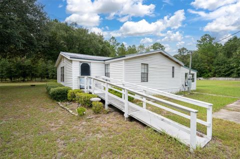Photo of 921 SE Adams Street, High Springs, FL 32643 (MLS # GC534319)
