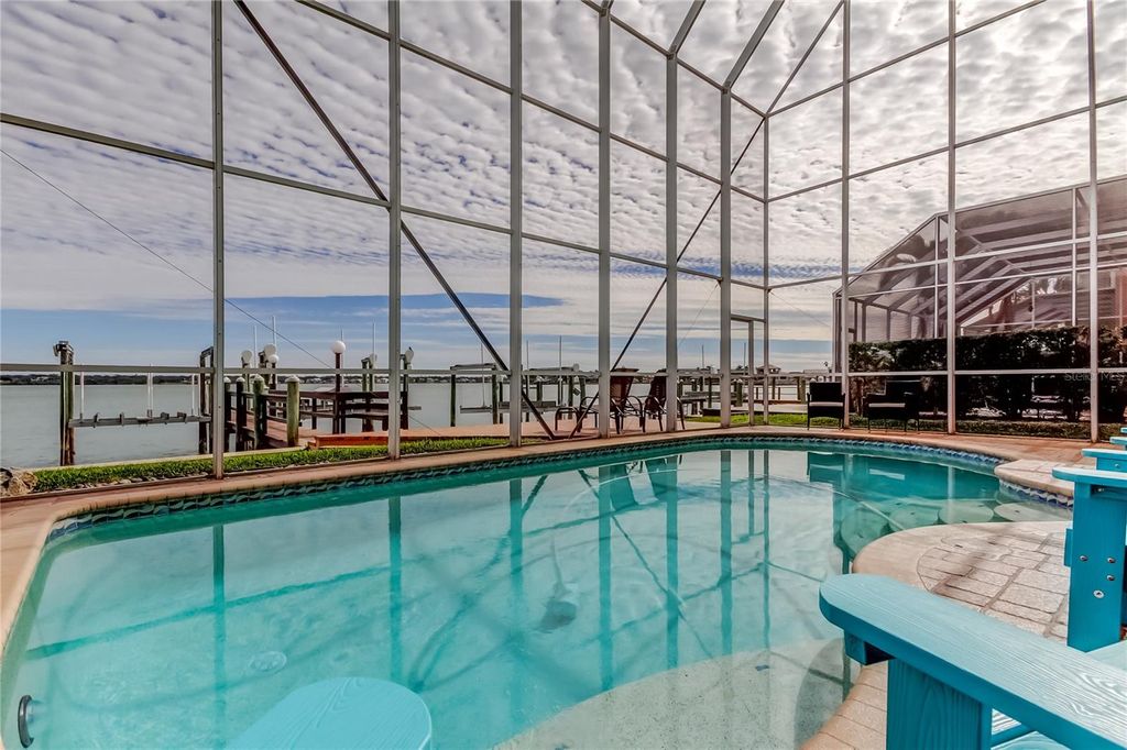 Photo of 218 Sand Key Estates Drive, Clearwater Beach, FL 33767 (MLS # TB8458516)