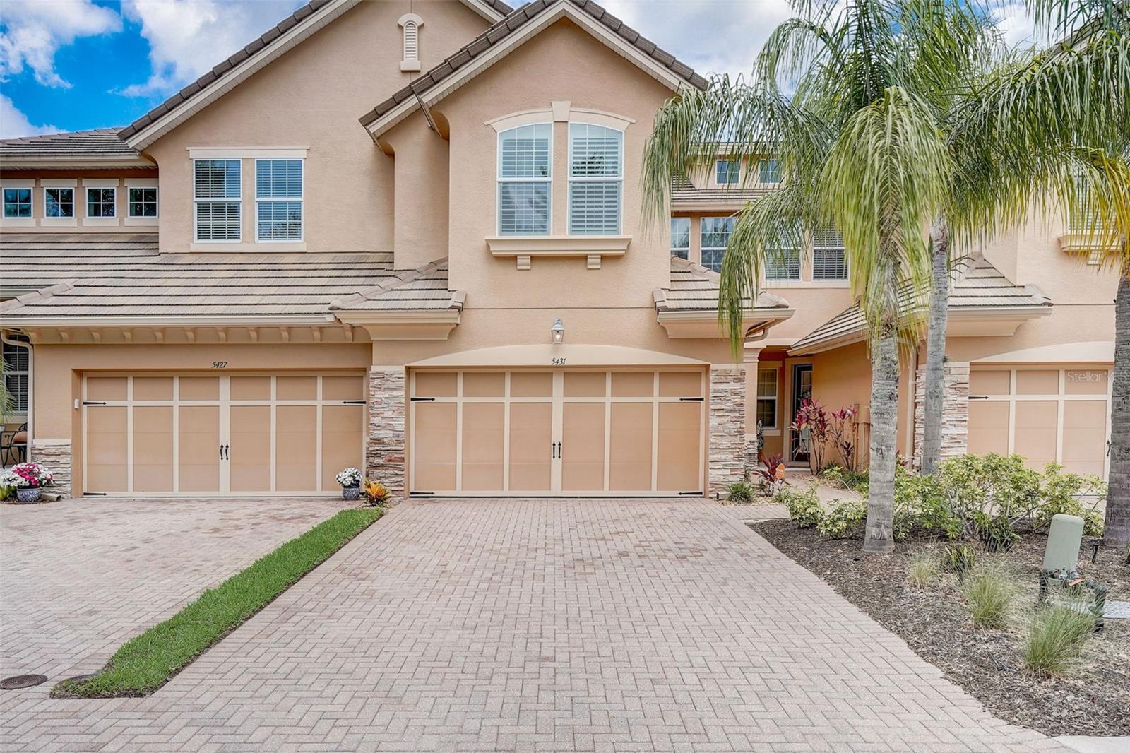 AVAILABLE NOW! Nestled within the tranquil GATED community of Sonoma, off University Parkway in Sarasota, Florida, lies a charming townhome at 5431 NAPA DRIVE. This meticulously maintained residence offers 3 bedrooms, 2.5 bathrooms, and a 2-car garage, spanning 1,818 square feet of living space. Inside, discover light plank floors on the first level and tiled surfaces in the kitchen and entrance. The living area is spacious and open, with generous room sizes and a convenient desk area upstairs. Enjoy privacy and serene views from the extended covered and screened paver lanai, overlooking a lush nature preserve. The townhome features high ceilings, hurricane impact-resistant windows, and stored shutters for added security. The kitchen boasts a floor-to-ceiling pantry, stainless steel appliances, pull-out cabinets, tiled backsplash, and under-counter lighting, seamlessly flowing into the dining room and family room. Additionally, the upstairs laundry room offers added cabinets for storage. Residents of Sonoma have access to community amenities including a pool, basketball court, and playgrounds. Beyond the community, enjoy easy access to Sarasota's beaches, UTC shopping center, Benderson Rowing Park, restaurants, and hospitals. Available for an annual immediately, this townhome presents a perfect blend of comfort, convenience, and lifestyle. Medium to large dogs permitted.