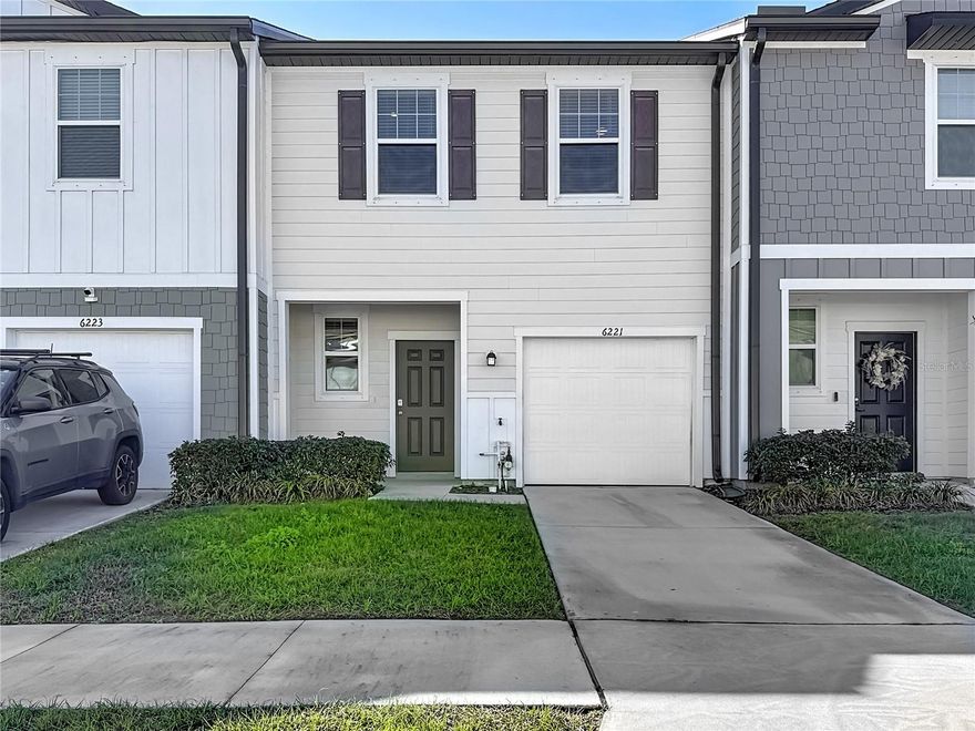 Why wait for new construction when you can have the “like-new” feel right now—without the dust, delays, or punch list? This nearly-new 3-bedroom, 2.5-bath townhome is sparkling clean, turnkey, and ready for you, it’s next owner! Whether you are a first-time homebuyer or wishing to add your first investment property to your portfolio, you’ll notice how well this home has been cared for—fresh, modern finishes and an open layout that flows easily from the kitchen to the living and dining areas. Luxury vinyl plank throughout the first floor.  The kitchen is the heart of the home with stainless steel appliances, granite counter tops with plenty of workspace, and a layout that keeps you connected whether you’re hosting friends or family, or just grabbing coffee before heading out. Upstairs, the primary suite is a quiet retreat with large custom closet storage and adjacent to the ensuite bathroom. Two generously sized bedrooms offer comfortable space and ample closets for guests, home office needs, or everyday living. The Samsung washer and dryer convey & are conveniently located upstairs.  Helpful upgrades already done: ceiling fans in the primary suite, living room, and one secondary bedroom, plus a garage door opener for easy access. No CDD and a low HOA includes grounds maintenance, keeping life simple. Conveniently located in Dug Creek with quick access to shopping, dining, and commuter routes—and for boating enthusiasts, Riverview Marina is within 5 miles. This one is clean, current and truly move-in ready. Just bring your furniture and your toothbrush!
