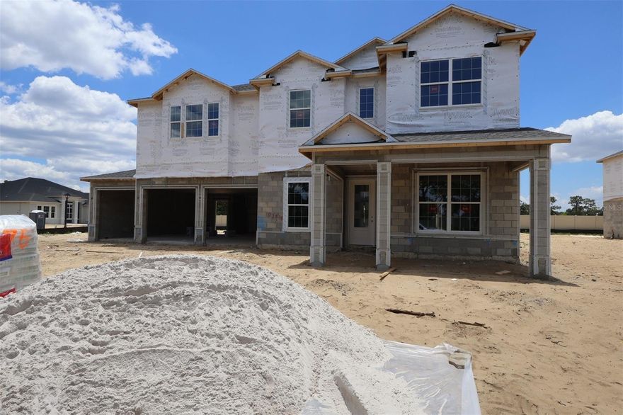 Under Construction. If you're searching for a spacious, single-story home that offers 5 bedrooms, 4 baths, and a 4-car garage, 3539 Wolves Creek Place in Apopka, FL is your perfect match! With 4,728 square feet of thoughtfully designed living space, this plan combines privacy, comfort, and versatility for today's modern lifestyle.

Step inside and be welcomed by a formal dining room and a private den, ideal for hosting elegant dinners or creating a quiet home office. At the heart of the home, the open-concept kitchen shines with a large island and an inviting eat-in nook, all overlooking the impressive 20' x 21' family room—perfect for entertaining or relaxing with loved ones.

A first-floor guest suite just off the family room makes multi-generational living effortless. Oversized windows and 8-foot pocket sliding doors flood the home with natural light and create a seamless connection to the outdoors, where you can enjoy your lanai in style.

Upstairs, discover a loft retreat surrounded by secondary bedrooms and the luxurious owner's suite, featuring a spacious walk-in closet, dual vanities, linen storage, a separate shower and a soaking tub for a spa-like experience.

Contact us today to learn more!