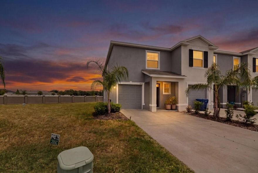 Who wants FREE ACCESS to EPPERSON LAGOON for you and your family and maintenance free living? Come check out this “ALMOST NEW” stunning END UNIT townhome with 3 BEDROOM, 2.5 BATH, 1-CAR that even comes with 4,557 SF of property. 

This 2023 Built townhome is located in a gated community in the highly desirable RESORT-STYLE COMMUNITY of Epperson in the heart of Wesley Chapel. 

From the moment you arrive, you’ll appreciate the inviting FOYER ENTRY that flows seamlessly into a spacious GREAT ROOM FLOOR PLAN, combining the living and dining areas. The chef-inspired kitchen serves as the centerpiece of the home, featuring GRANITE COUNTERTOPS, a LARGE ISLAND WITH BREAKFAST BAR, DEEP SINGLE-BASIN SINK, abundant cabinetry, a stylish SUBWAY TILE BACKSPLASH, and a convenient COFFEE BAR, all open to the main living room.

Step outside to your private SCREENED-IN LANAI, perfect for relaxing or entertaining year-round. As a desirable CORNER / END UNIT, this home provides added privacy along with an abundance of natural light and 4,557 SF of property.

Upstairs, you'll find a versatile LOFT AREA, ideal for a home office, media space, or additional lounge area, along with beautiful LUXURY VINYL FLOORING. The SPACIOUS PRIMARY SUITE offers a true retreat, complete with two WALK-IN CLOSETS, DOUBLE SINK VANITY, and a beautifully designed GLASS-ENCLOSED WALK-IN SHOWER enhanced with CUSTOM FLOOR-TO-CEILING TILE for a sleek, spa-like finish. The two additional bedrooms are generously sized and share a convenient JACK AND JILL BATHROOM, thoughtfully designed with a TUB/SHOWER COMBINATION. A convenient HALF BATH DOWNSTAIRS adds functionality for guests, along with an INSIDE LAUNDRY AREA for everyday ease.

Enjoy living in a vibrant, fast-growing area with unmatched amenities, including exclusive access to the world-renowned EPPERSON METRO LAGOON, a breathtaking CRYSTAL BLUE WATER LAGOON that delivers a true tropical lifestyle. Your HOA includes lagoon access plus 25 GUEST PASSES PER YEAR, making it easy to share the experience with friends and family.

The community offers an impressive array of resort-style amenities, including SWIMMING & BEACH LOUNGING, WATER SLIDES & OBSTACLE COURSE, KAYAKING & PADDLE BOARDING, BUMPER BOATS, VOLLEYBALL COURTS, as well as PRIVATE CABANAS & SOCIAL SPACES. Additional highlights include ULTRAFAST CABLE INTERNET INCLUDED, beautifully maintained grounds, and a community designed for an active Florida lifestyle.

Ideally located in a PRIME LOCATION just minutes from TOP-RATED SCHOOLS, shopping, dining, and entertainment, this home offers exceptional convenience with BayCare Wesley Chapel Hospital nearby and the future Johns Hopkins All Children’s Hospital just down the street. Everyday essentials and popular spots like Publix, Chick-fil-A, Wendy’s, and local veterinary offices are all within walking distance, along with two high schools accessible by foot or golf cart. With easy access to major highways for a quick commute to Tampa and surrounding areas, this property delivers the perfect blend of MODERN LIVING, RESORT-STYLE AMENITIES, and UNBEATABLE CONVENIENCE—ideal as a primary residence, vacation home, or investment opportunity.