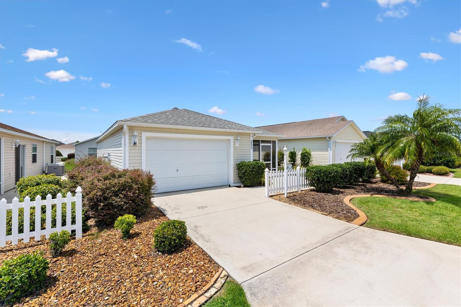 Lovely Two Bedroom, Two Bathroom, 1156 Square Foot Patio Villa located in the Leyton Villas, in the Village of Dunedin, The Villages! This well maintained home is being sold TURN KEY and features a Primary Bedroom with an En Suite Bathroom and a Walk in Closet, with a second Guest Bedroom and Guest Bathroom. The Kitchen has an Eating Area, Breakfast Bar, and Pantry and opens to the Living Room and Dining Area. The open floor plan gives this home an open and airy feeling. This Villa also has a Screened Lanai and Patio which is perfect for enjoying those relaxing, warm Florida evenings and is located in a quiet neighborhood, conveniently located near shopping, medical facilities, restaurants, recreation centers and Brownwood Paddock Town Square. Call today to view this charming home!