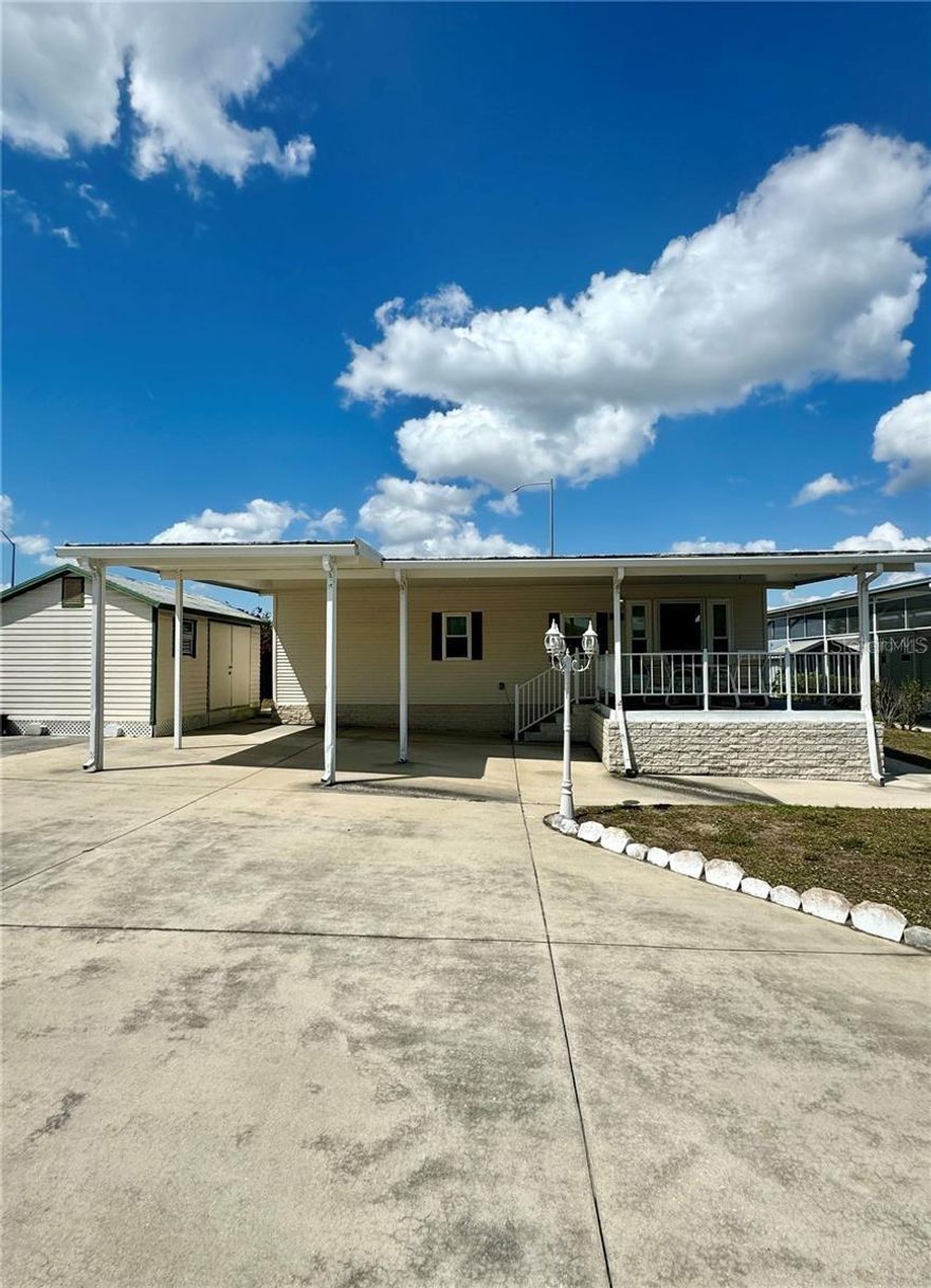 SELLER WILL PAY ONE YEAR OF HOA'S WITH PURCHASE OF PROPERTY!  Buy the home as is!  With a few updates, this home has lots of potential!  Another option is lots can be split.  Live on one lot & sell or rent other lot!  MOTIVATED SELLERS WITH LOTS OF OPTIONS! Welcome to DEER CREEK RV GOLF & COUNTRY CLUB!  It’s the perfect time to purchase your new FLORIDA GETAWAY!  Whether you are looking for a sunny place to winter or a full-time residency, this two-bedroom, two-bath, well-maintained park model is perfect!  Situated on two lots in Osprey Point, this home boasts an open floor plan with living, kitchen & dining room! Sliding doors off the kitchen lead to the Florida Room overlooking the back yard!  Beautiful green space with lots of flowering bushes & trees!  The large, covered patio/carport is a great place for entertaining with family & friends!  There’s plenty of parking for your cars & golf carts plus a shed for storing your golf clubs & toys.  You’ll love sipping your coffee or reading your favorite book on the 12 x 12 front deck!  The Osprey Point Community Clubhouse, Pool, Hot Tub, Shuffleboard Courts & many activities are just a golf cart ride away!  If you love RESORT style living, this is the place for you & perfect for guests!  Deer Creek Community also has a MAIN CLUBHOUSE offering a variety of social events throughout the year such as Karaoke, Trivia, Line Dancing, Crafts, Swing Dancing & more!  Soak up the sun at Deer Creek’s MAIN pool, cabana & hot tub area! Try water volleyball, pickleball, tennis, shuffleboard or pool aerobics!  Love golfing? Check out Deer Creek’s 18 Hole Executive Golf Course Leagues & shopping at the Pro Shop! The Tiki Bar is a great place to meet new friends with occasional live bands & music! The Greenside Grill is perfect for onsite dining!  Deer Creek is centrally located in Davenport just 20 minutes from Disney & all the attractions that families enjoy! Hop on your golf cart & ride to many restaurants & shops nearby. Bealls, Marshalls, Target & Star Bucks are in Posner Park less than a mile away! Call today to view this HIDDEN GEM in sunny Florida! Just 1.5 hours to each COAST! A new Publix is opening soon just across the street!  Let us show you Deer Creek RV Golf & Country Club today!