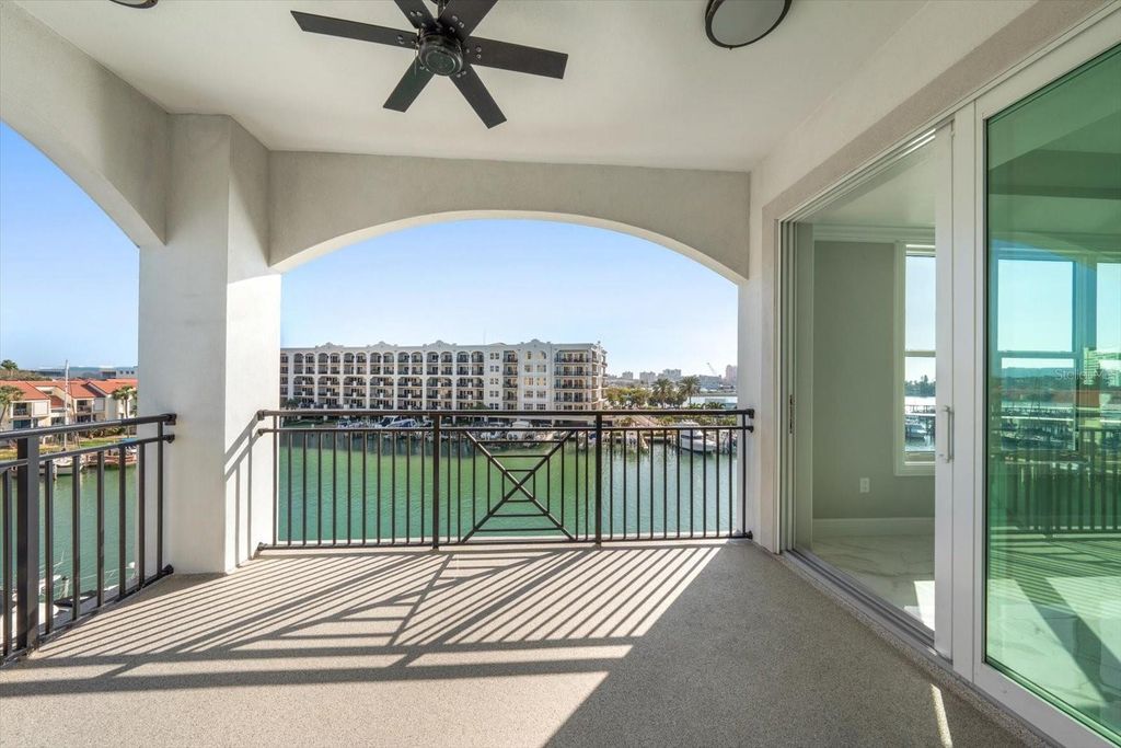 Photo of 211 Dolphin Point #401, Clearwater Beach, FL 33767 (MLS # TB8485717)