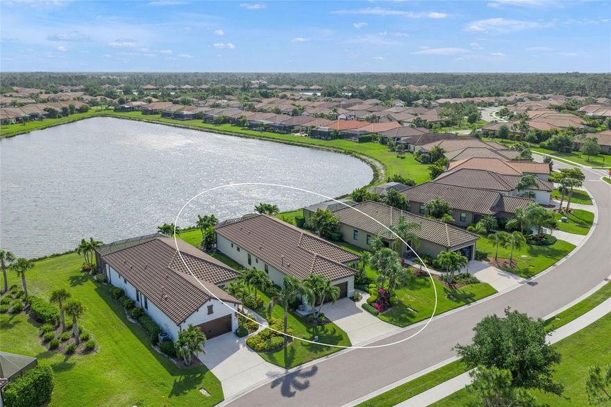 As you step inside, your eyes are immediately drawn through the expansive great room to breathtaking WATER VIEWS that capture the essence of waterfront living. The great room offers generous space enhanced by tray ceilings and elegant crown molding—among the many thoughtful upgrades found throughout the home which include IMPACT WINDOWS, EXTENDED LANAI, EXTENDED GARAGE. Experience the best of Milano’s exceptional amenities, including gated community, a clubhouse, resort-style pool and spa, pickleball courts, dog park, BBQ area, and scenic nature trails—all with LOW HOA FEES and NO CDD. Ideally located just minutes from the beaches of Venice, Nokomis, and Sarasota, as well as world-class golf courses and I-75 for easy access to downtown and nearby airports. Combining low-maintenance living with upscale features and an unbeatable location, this home is an outstanding opportunity—ideal for downsizing, seasonal living, or simply enjoying the best of Sarasota.