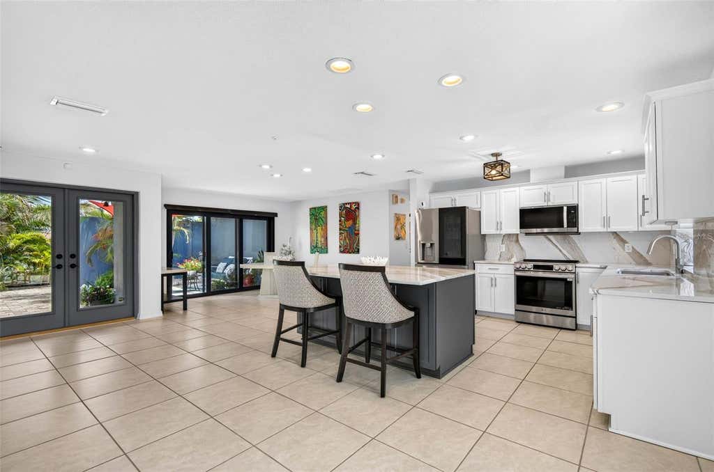Photo of 114 12th Street, Belleair Beach, FL 33786 (MLS # TB8540721)