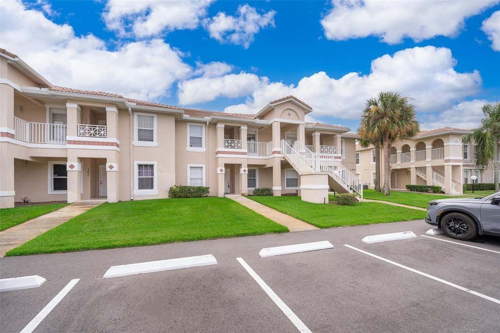 Photo of 13403 Fairway Glen Drive #203, Orlando, FL 32824 (MLS # O6436191)