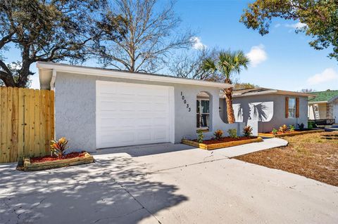 Photo of 10033 Regency Park Boulevard, Port Richey, FL 34668 (MLS # TB8474887)