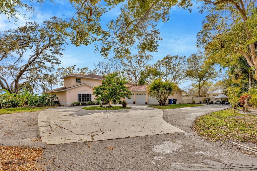 Photo of 7201 Hodgewood Ct, Tampa, FL 33614 (MLS # TB8448439)