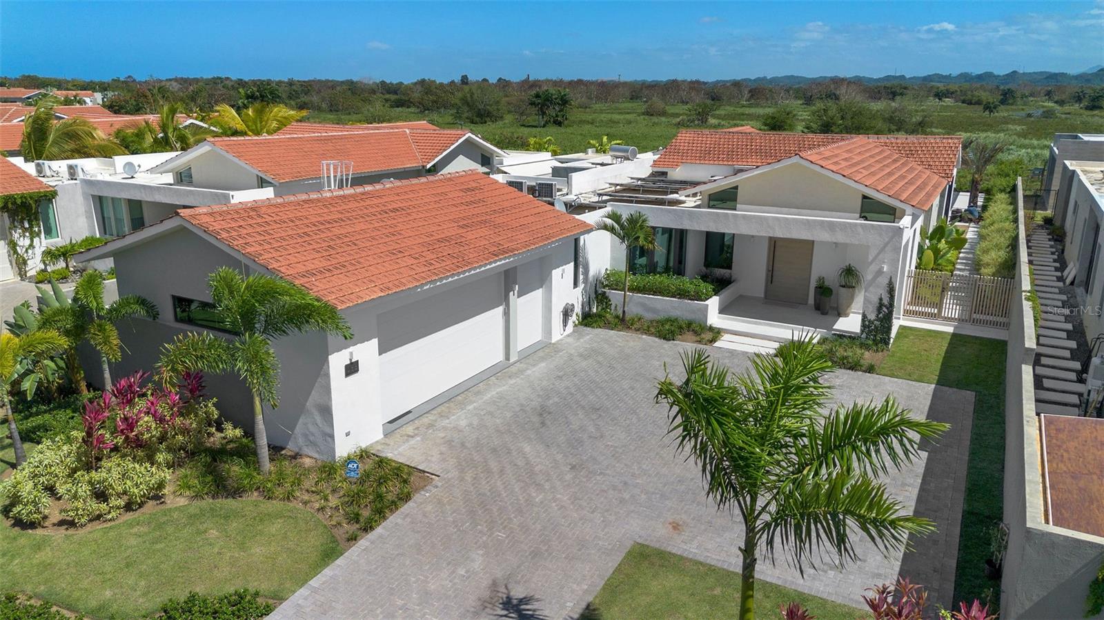 This stunning 5-bedroom, 5.5-bathroom residence is located in the exclusive community of Sabanera de Dorado. With 5,500 SQ. FT. of construction on a 1,350 SQ. MTS. lot, this property offers a perfect blend of elegance, comfort, and sustainability.
The home features full solar panels, a 30 kW generator, and a water cistern, ensuring energy efficiency and uninterrupted power. The air-conditioned garage includes a car lift, making it a dream for car enthusiasts.
Designed for luxury living, this property offers spacious living areas, modern finishes, and an excellent location close to top-tier schools, amenities, and the beach.
Don’t miss this exceptional opportunity—schedule a private showing today!