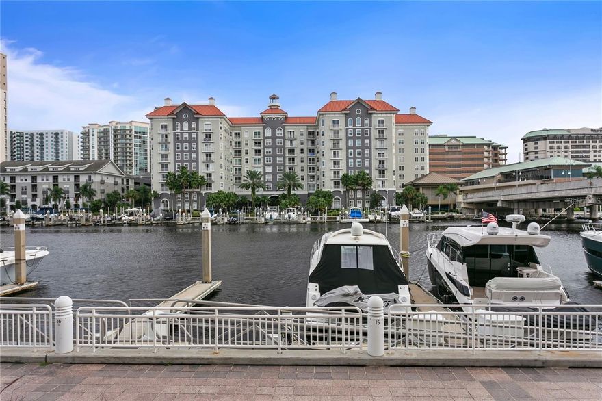 Beautifully appointed upscale Harbour Island condominium offers breathtaking views of the lush courtyard garden and tranquilizing water fountain! 2 Bed/2Bath Condo professionally designed with a modern, yet casual tropical and luxurious appeal. Several upgrades including elegantly maintained granite counter tops throughout, modern laminate floors throughout, above grade lighting fixtures and ceiling fans throughout and much more!! There are 2 attached Garage parking spaces, one assigned and one unassigned. Short distance to, Downtown, Riverwalk, Benchmark International Arena, Water Street, Convention Center, shops, and popular waterside restaurants. On-site facilities, include a state-of-the-art fitness center, business center, a library, a traditional billiard, and gathering room, with eye-level open air gardens and relaxing water fountains. In addition, there is an inviting, open air, Olympic size pool with a spa overlooking beautiful Tampa Bay and the Downtown skyline! To truly appreciate all the features this unit has, a visit is a must. The combination of the prime location, luxurious design and a range of amenities makes this Harbour Island Condo an attractive option for those seeking urban retreat and comfortable living experience.