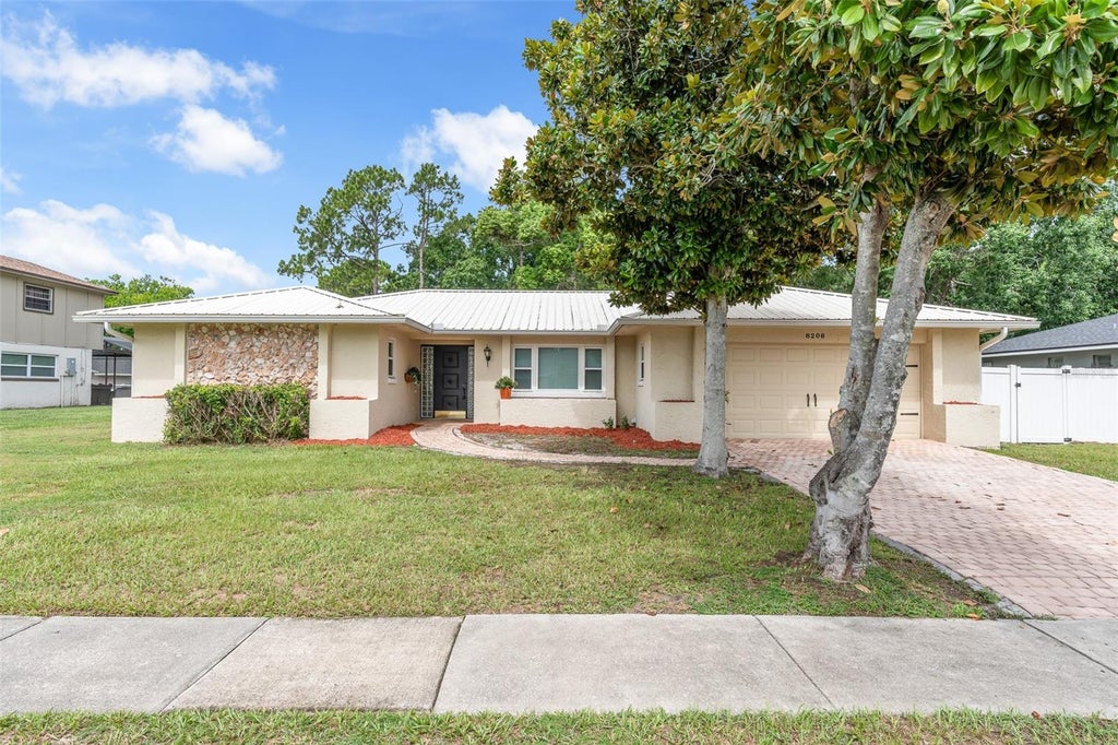Photo of 8208 Tansy Drive, Orlando, FL 32819 (MLS # O6425213)