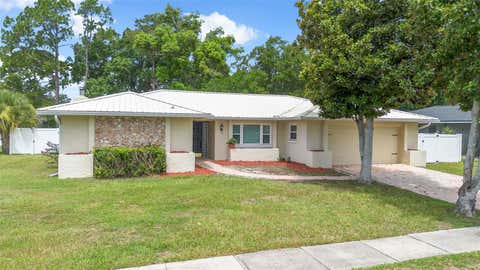 Photo of 8208 Tansy Drive, Orlando, FL 32819 (MLS # O6425213)