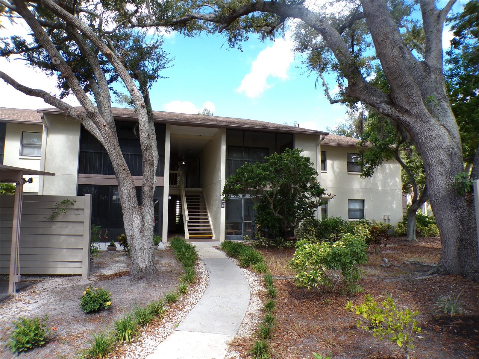 Large corner condo on second floor with a primary view of lanai of lake and trees. This two/two and convertible third bedroom/den has two large walk-in closets. It also has a large refrigerator and pass-through at counter to dining area. Small storage room is in hallway on same floor as unit. Building is of heavy concrete block construction.
Tenant has right to use all recreation facilities. Feel like you are on vacation year around!
Tennis, Pickleball, Pools, Gym, Recreation Center, and more, Close to I-75 access north and south to get to several airports, walk to shopping , or shop downtown . Legacy bike trail is next to Bird Bay Village, and last but not least, very fine beaches are minutes away !