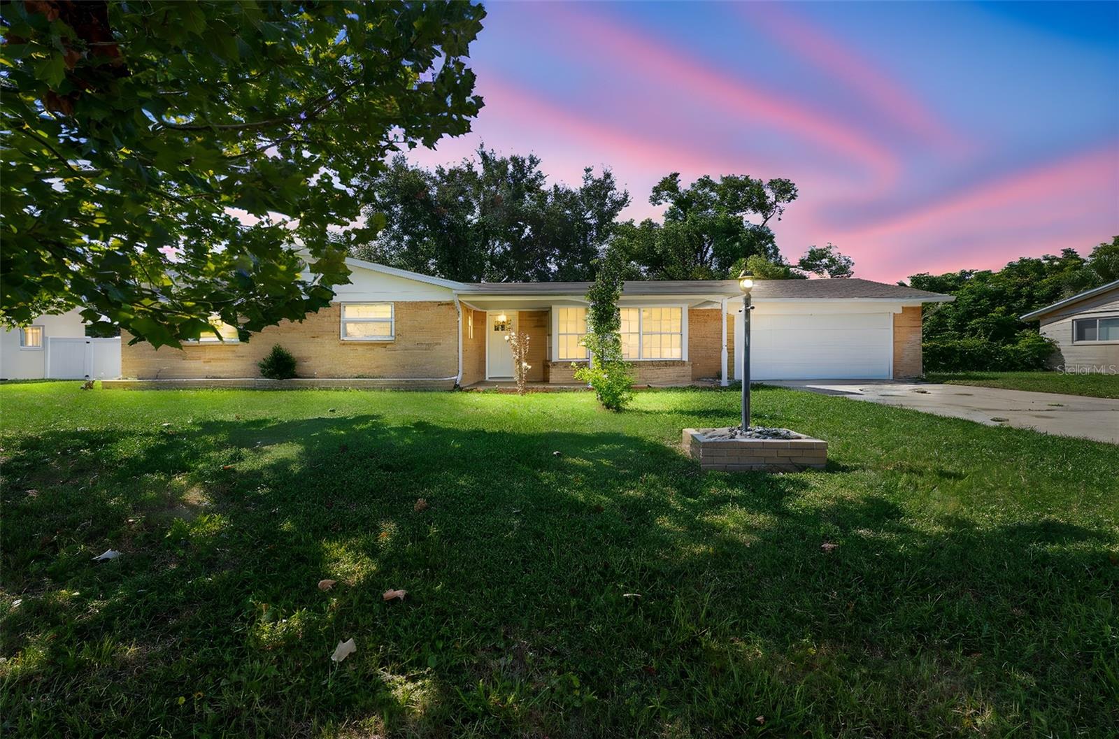 Welcome to your new home in South Daytona Beach!—A beautifully maintained 3-bedroom, 2-bathroom home with 1984 sqft of living space and a detached 2-car garage that is larger than what you would find in your average home. Perfectly located in a highly desirable area just minutes from shopping, dining, and the beach! This home offers generously sized rooms throughout, including a large family room with a cozy fireplace, and a light-filled living room thanks to the charming and large bay window. The kitchen features a refrigerator and dishwasher that are less than 2 years old, and the AC unit was installed just last year for your comfort and peace of mind. Outside, enjoy a freshly pressure-washed and painted exterior, along with a screened in patio and a oversized yard that is partially fenced perfect for entertaining, pets, or outdoor fun. This home has good bones and has been well maintain it's just missing your custom finishes and it has been priced with that in mind! Don’t miss the chance to own this spacious, move-in-ready home in a great location! Schedule your private tour today!