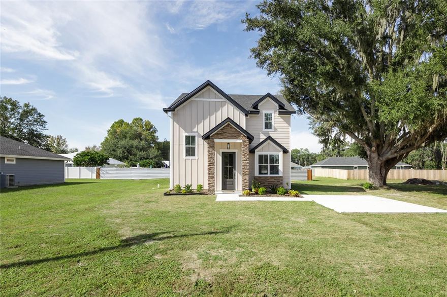Check out this amazing 3-bedroom, 2.5-bathroom home located in beautiful Brooker! Step inside to find a gorgeous kitchen featuring stainless steel appliances, stone countertops, and rich wood cabinetry — perfect for any home chef. The open floor plan creates a spacious and inviting atmosphere, ideal for entertaining family and friends. This home showcases luxury vinyl plank flooring and plush carpeting throughout, making cleaning and maintenance a breeze. Built with energy efficiency in mind, it includes spray foam insulation to help keep utility costs low. Premium light fixtures and ceiling fans add a touch of elegance, highlighting the attention to detail and quality craftsmanship that went into every inch of this home. Conveniently located less than an hour from Jacksonville and under 20 minutes from Gainesville — home to Shands Hospital and the University of Florida — this property offers the perfect balance of comfort, style, and location. Call today for more information before this incredible home is gone!