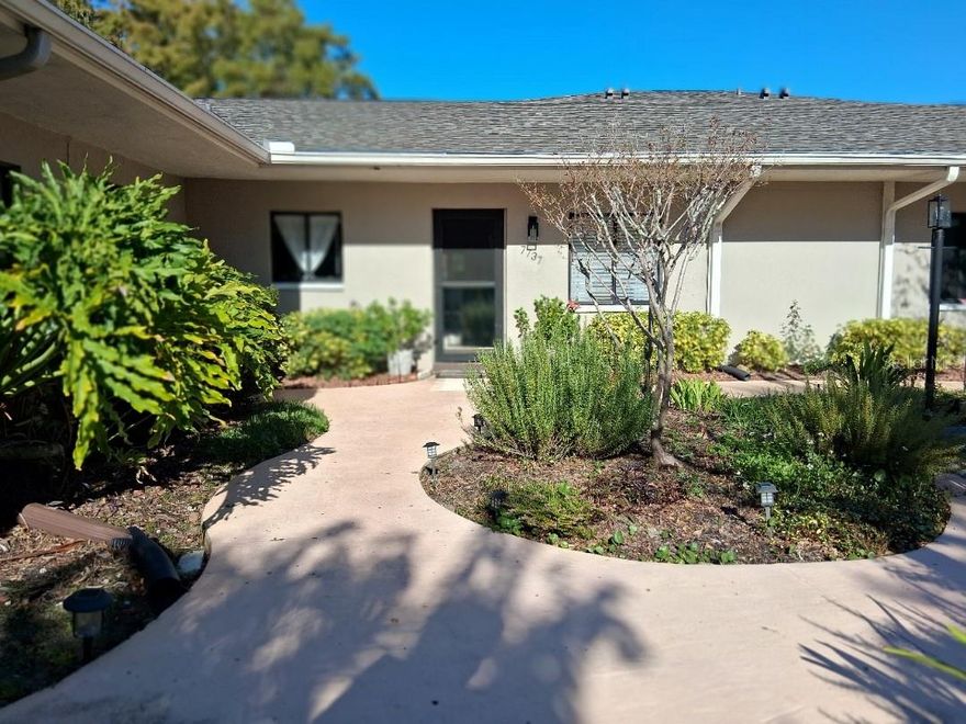 WOW! Totally updated, impeccably maintained single story, 55+ condo at Country Oaks with pond and nature views right outside your back door. The front entrance is through a large, friendly, courtyard. The kitchen and bathrooms have been remodeled with hardwood cabinetry with soft-close pull-out drawers and doors, granite counter tops, and modern appliances. The floors in the living room, dining area, kitchen and glass-enclosed sun room all have wood-look ceramic tile floors, and the bedrooms have luxury vinyl floors. The master closet has been smartly fitted with a closet organizer. Nothing has been overlooked in this beautiful condo. There’s even instant hot water thanks to the tankless water heater and the kitchen is fitted with convenient, stylish, stacked laundry machines. The rent includes water and sewer utilities, trash service,  exterior  maintenance & grounds, upgraded cable television, internet service and community pool (currently closed for renovation). The location is extremely convenient to HCA Florida Bayonet Point Hospital and other medical facilities, the Hudson Library, Hudson Beach, churches, shopping, restaurants, music venues, etc. Sorry, no pets except for certified service animals. The condo is offered unfurnished and is available January 1, 2026.