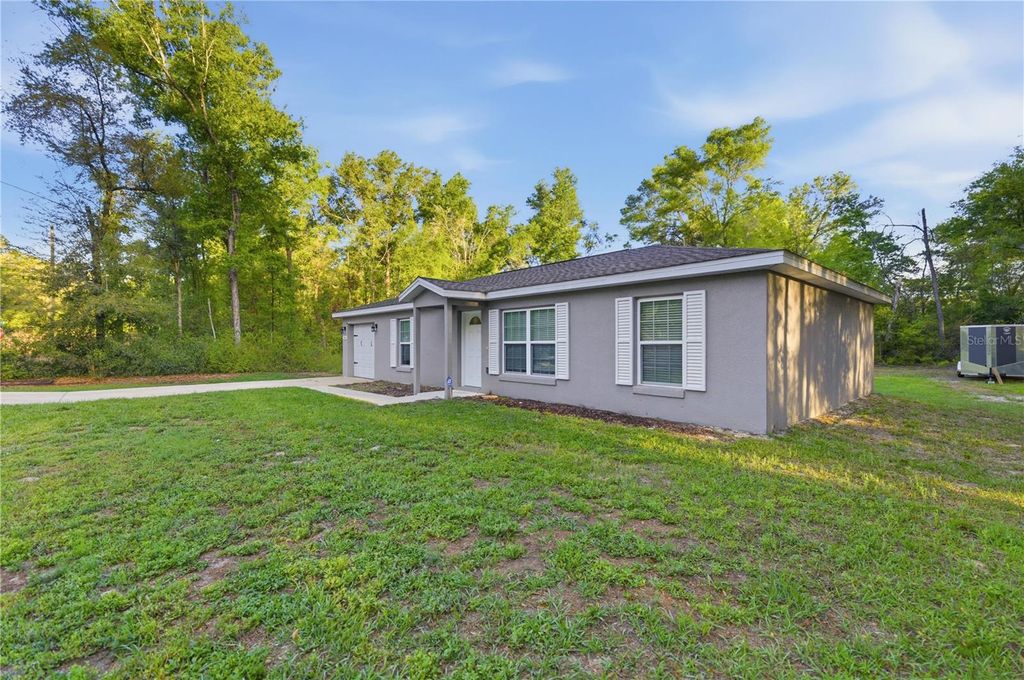 Photo of 15541 NE 13th Lane, Williston, FL 32696 (MLS # OM722853)