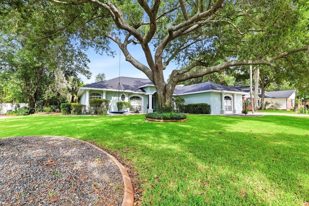 Photo of 6636 Royal Forest Drive, Lakeland, FL 33811 (MLS # O6417953)