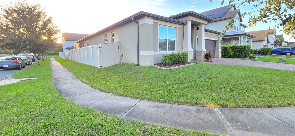 Photo of 1657 Cheshire Oaks Lane, Orlando, FL 32825 (MLS # O6453619)