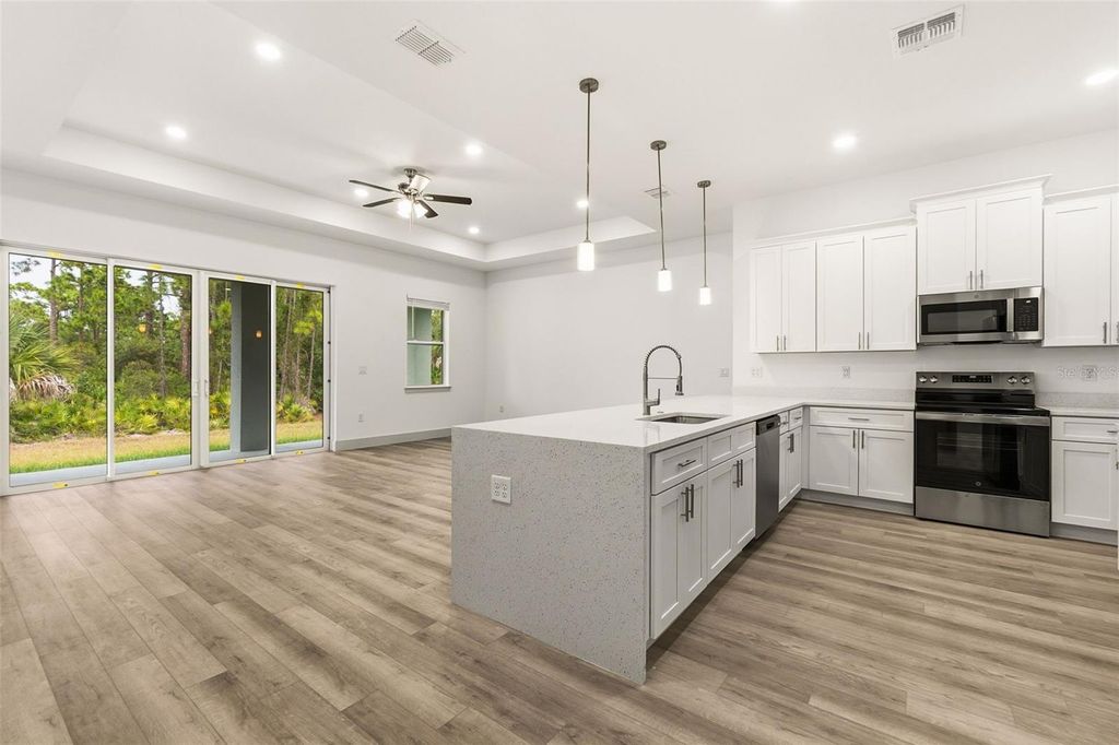 Photo of 23368 Mayville Avenue, Port Charlotte, FL 33980 (MLS # O6359751)