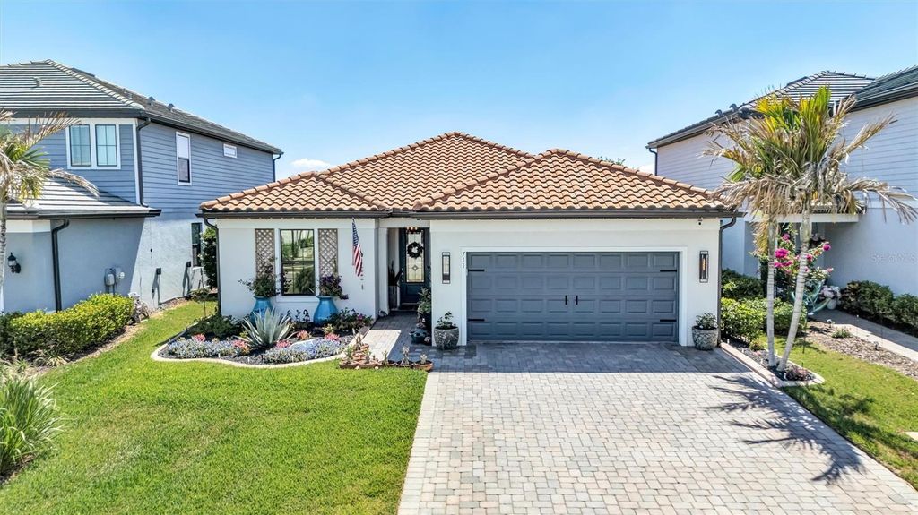 Photo of 711 Pintail Cove, Bradenton, FL 34212 (MLS # A4693004)
