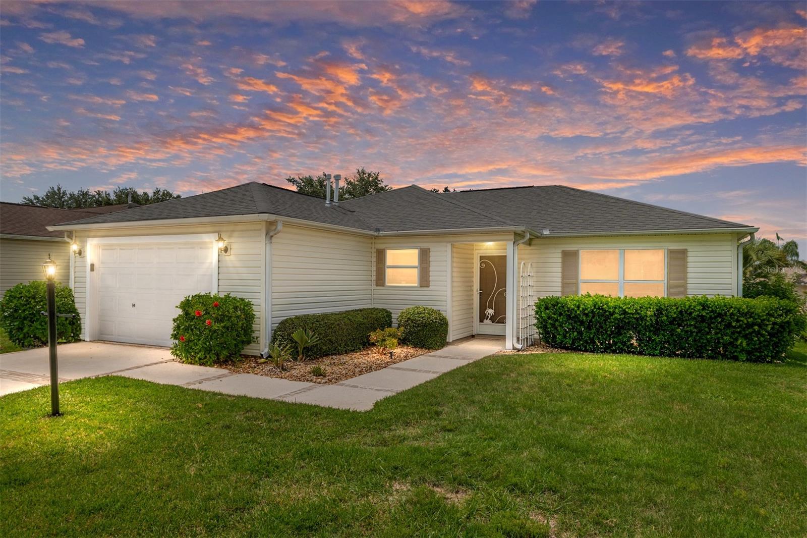 COZY & PARTIALLY FURNISHED with GAS GOLF CAR, this 3 bedroom, 2 bath CORPUS CHRISTI Floorplan combines comfort and convenience. Located in Chatham, you're close to Lopez, Mulberry Plaza and Shopping on the 441 Corridor. The home has an Open Floorplan with Volume Ceilings and a split bedroom layout ensuring privacy for you and your guests. Throughout the home you will find the same CERAMIC TILE on the diagonal - NO CARPET! The KITCHEN boasts GRANITE counters, STAINLESS APPL (NEW) with GAS STOVE, REVERSE OSMOSIS system and closet pantry. The Primary EnSuite is spacious with a walk-in closet, GRANITE countertop, walk-in doored shower with double seats and linen closet. The Guest Area with POCKET DOOR for Privacy is on the opposite side of the home offering 2 additional bedrooms (one with no closet). The Guest Bath is between the two bedrooms with a tub/shower combo, GRANITE countertop and linen closet. This WELL PRICED home has all the Big ticket items taken care of for peace of mind. ROOF 2021, HVAC 2023, Water heater 2023. LOW BOND.