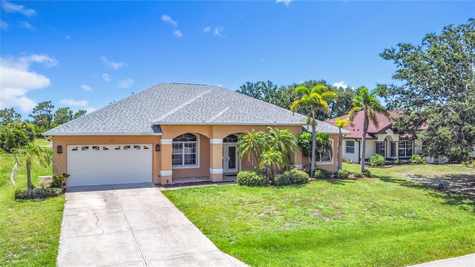 Golf Course Pool Home in Rotonda West – Move-In Ready!
Ready for immediate occupancy, this spacious and beautifully designed golf course home in Rotonda West offers a rare opportunity to enjoy Florida living without the wait. Situated on a desirable lot with wide fairway views, this home blends everyday comfort with standout architectural style.
The exterior features tropical landscaping and an attractive façade with elegant columns, arched windows, and a dynamic roofline that adds character and curb appeal. Step through the double glass front doors into a bright, open layout with high ceilings, detailed trim work, and tile flooring throughout the main living areas—perfect for easy maintenance.
Multiple sets of sliding glass doors lead to a screened lanai and private pool area overlooking the golf course, offering a peaceful place to relax, entertain, or take in the sunset thanks to the home’s ideal western exposure.
The kitchen is outfitted with granite countertops, stainless steel appliances, a tile backsplash, and a breakfast bar that opens to a generous family room—great for gatherings or quiet nights in. The split-bedroom layout offers privacy, with the primary suite featuring its own pool access, double closets, and a large en-suite bath with dual sinks, a walk-in shower, and granite surfaces.
A cozy breakfast nook with aquarium-style windows overlooks the pool, while the additional garage bay provides extra space for a workshop, golf cart, or hobby area.
Located in one of Southwest Florida’s most popular golf communities, you’re just minutes from beaches, marinas, restaurants, and shopping. With five golf courses to choose from in the community and quick access to Englewood and Boca Grande, every day feels like a vacation.
Whether you're relocating, investing, or looking for a seasonal escape, this unfurnished home is move-in ready and waiting for you. Schedule your showing today and make it yours!
