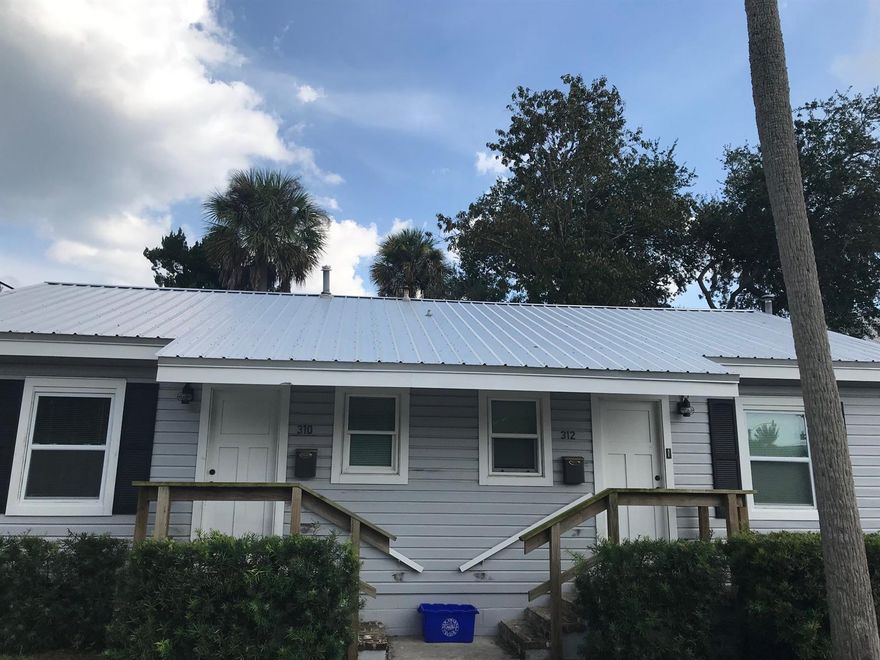 This old charm Duplex with Bright Colors and worn in comfort to create a Cozy Livable Space is located 1 block from Canal Street in the Heart of New Smyrna Beach. Also, a couple of blocks way is a Marina and Riverfront Parks along the Intracoastal Waterway. Walk to work, Shopping, Restaurants, Breweries, Art Shows, Farmers Market, Car Shows, Parades and other Festivities are part of this old Florida Neighborhood. In house Coin-Operated Laundry Facilities. An amazing location! This property has off the street parking. Will consider one dog under 35 lbs. Call Today for more information!