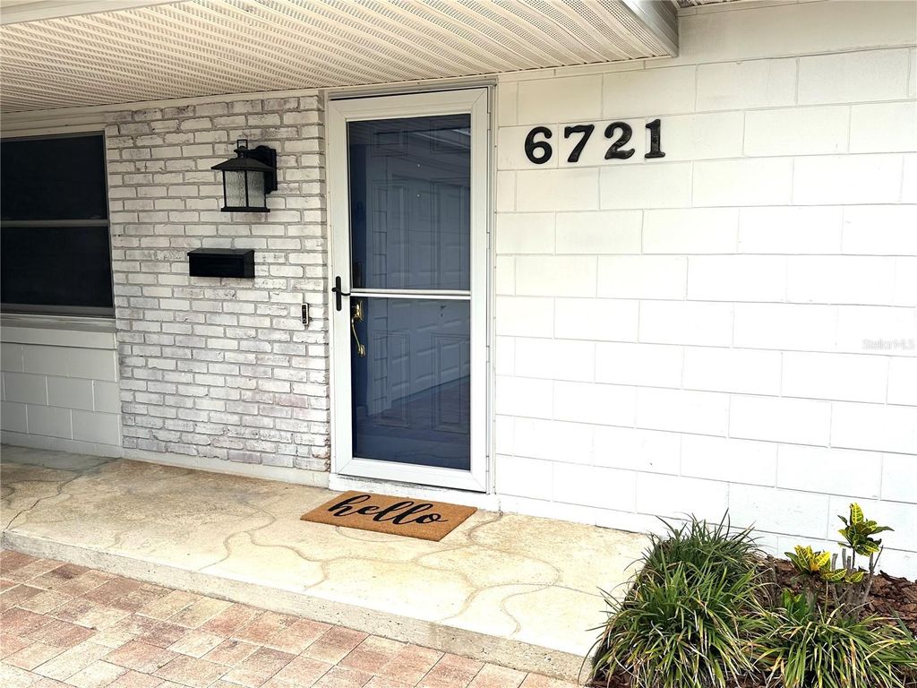 Photo of 6721 Precourt Drive, Orlando, FL 32809 (MLS # O6406355)