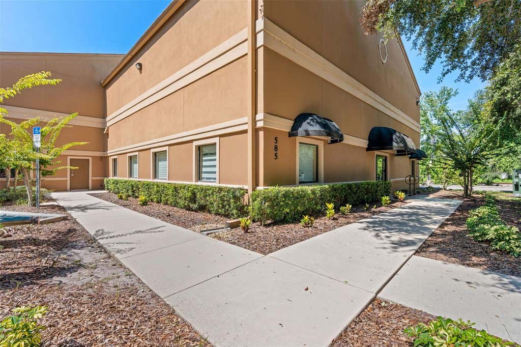 Photo of 585 Commonwealth Boulevard, Port Orange, FL 32127 (MLS # O6432566)