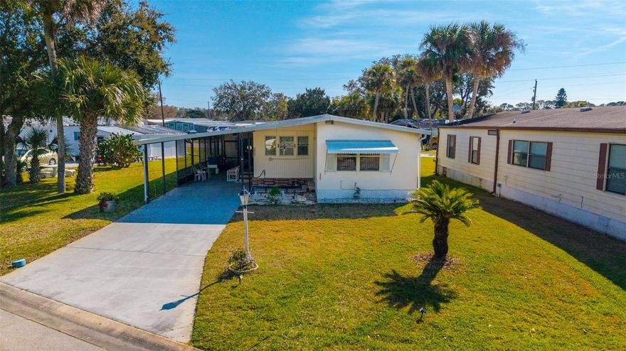 Welcome to your cozy oasis in Terra Mar Village! This charming 2-bedroom, 2-bath mobile home is nestled on a desirable street within this vibrant riverfront community. Enjoy access to fantastic amenities, including a boat dock, shuffleboard, two swimming pools (one heated), and the best part—no lot rent! The home features two spacious screened porches, a carport, and a bright eat-in kitchen complete with a new garbage disposal and dishwasher. Recent inspections confirm secure tie-downs, and this property remained high and dry through the recent hurricanes, offering peace of mind. The Terra Mar community is nestled along the river, offering a serene and picturesque setting. It's perfect for kayaking enthusiasts. Plus, you're just over 10 miles from the beach and can even watch stunning shuttle launches from the dock. Don't miss your chance to call this gem home.